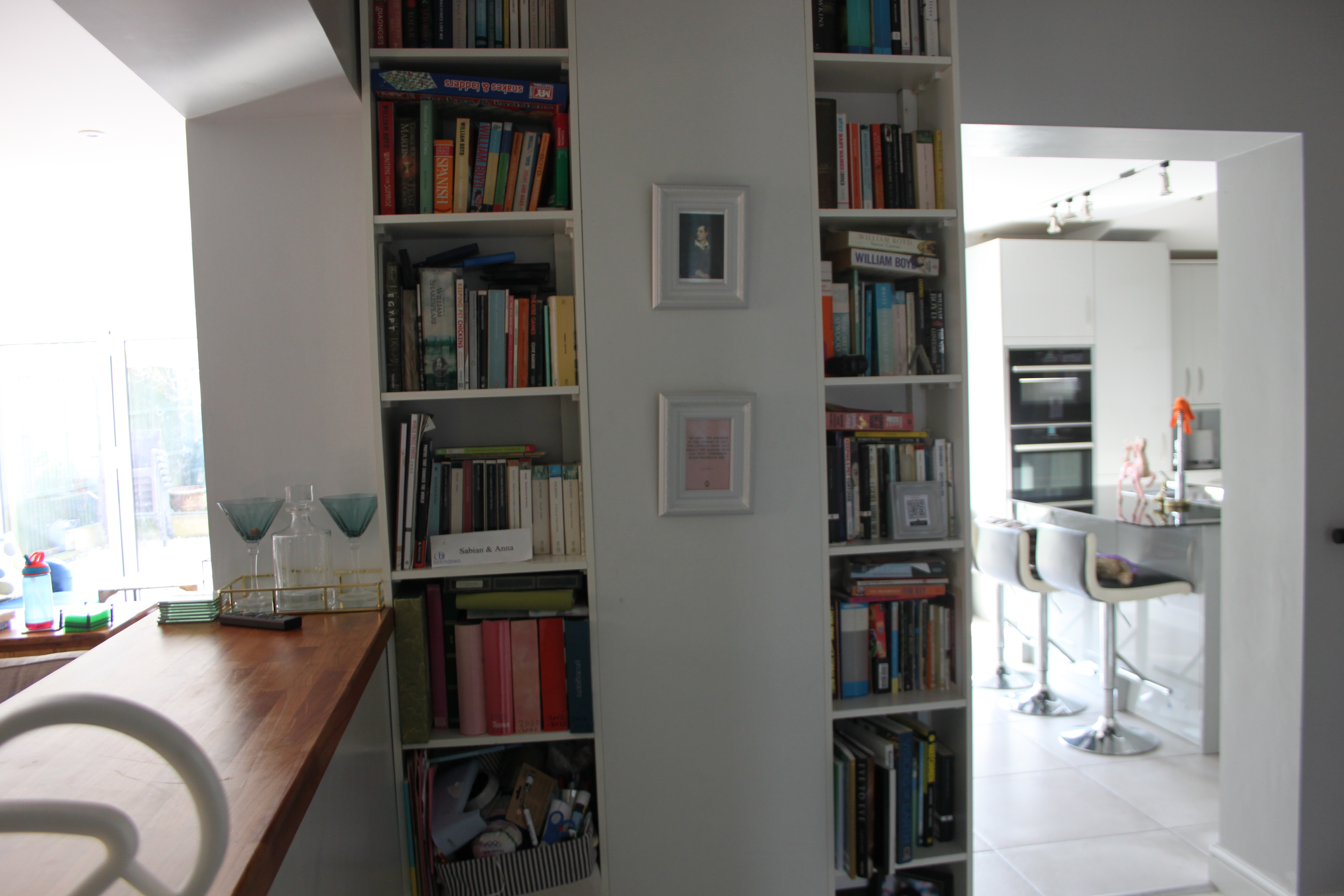 Overlooking open plan lounge area/family room with L shaped sofa. Can accommodate shots from multiple angles