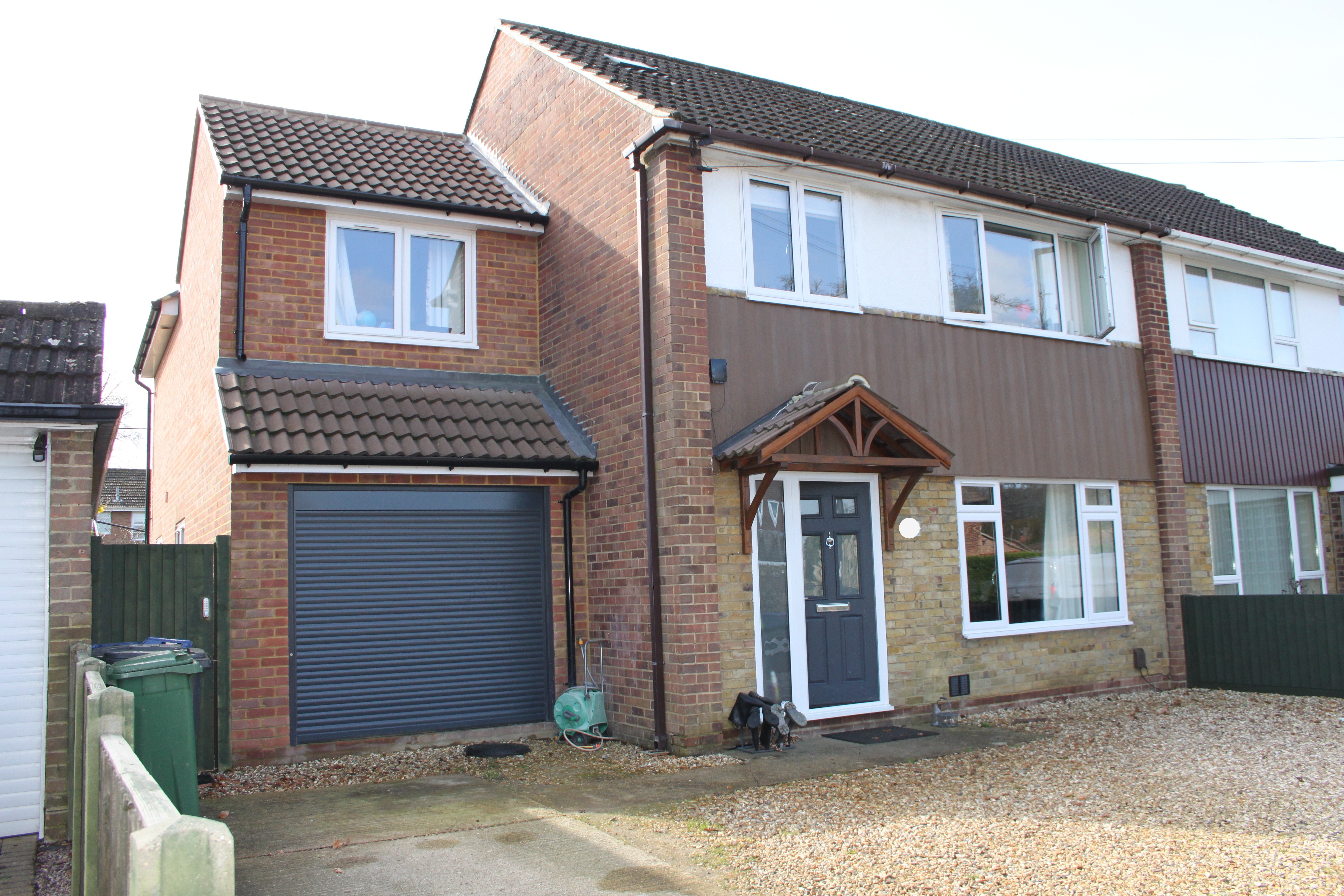 Front of house (semi detached family home) , with garage room and off street parking