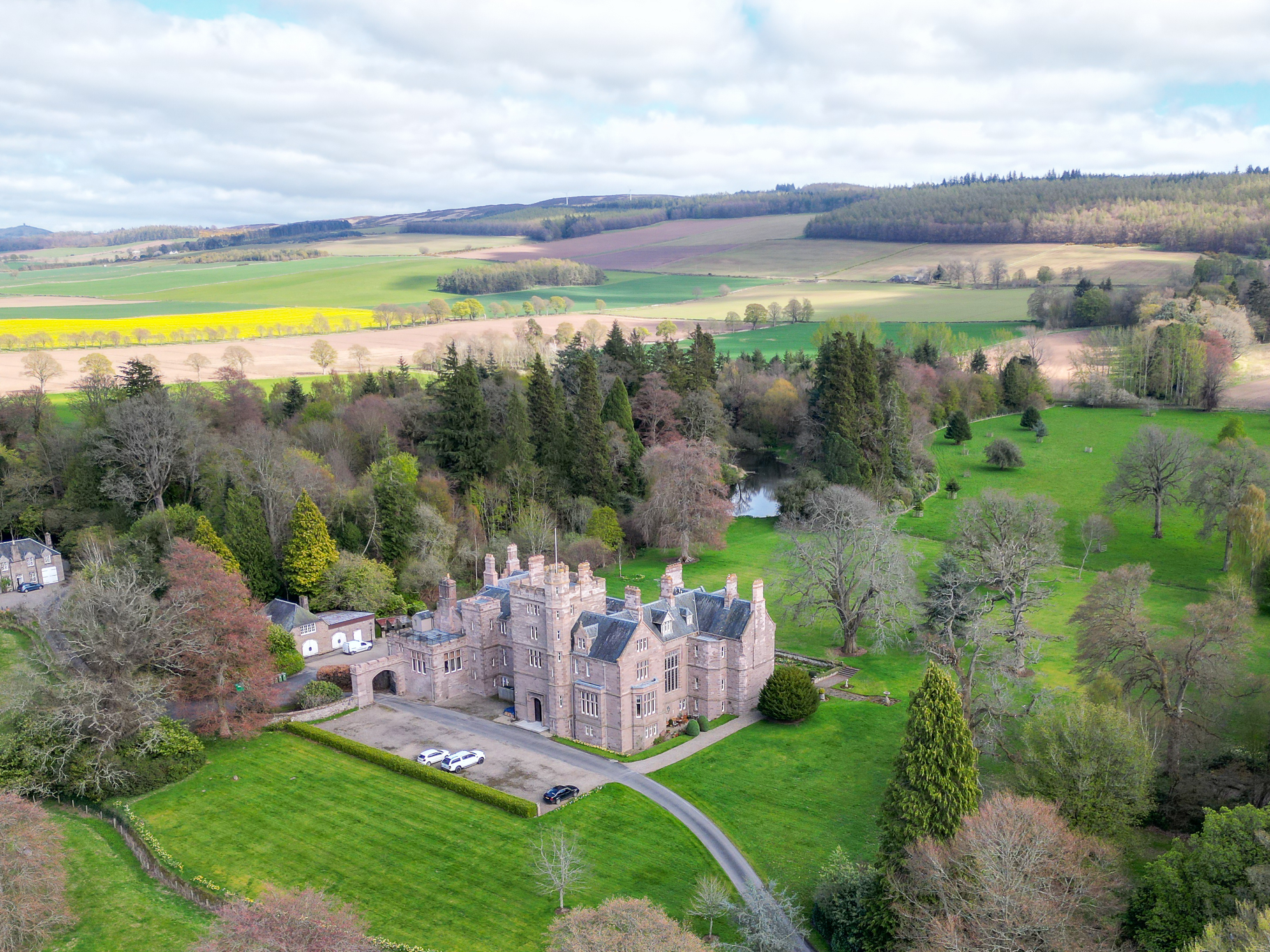 Aerial view of parkland and farmland Hallyburton Estate Scotland